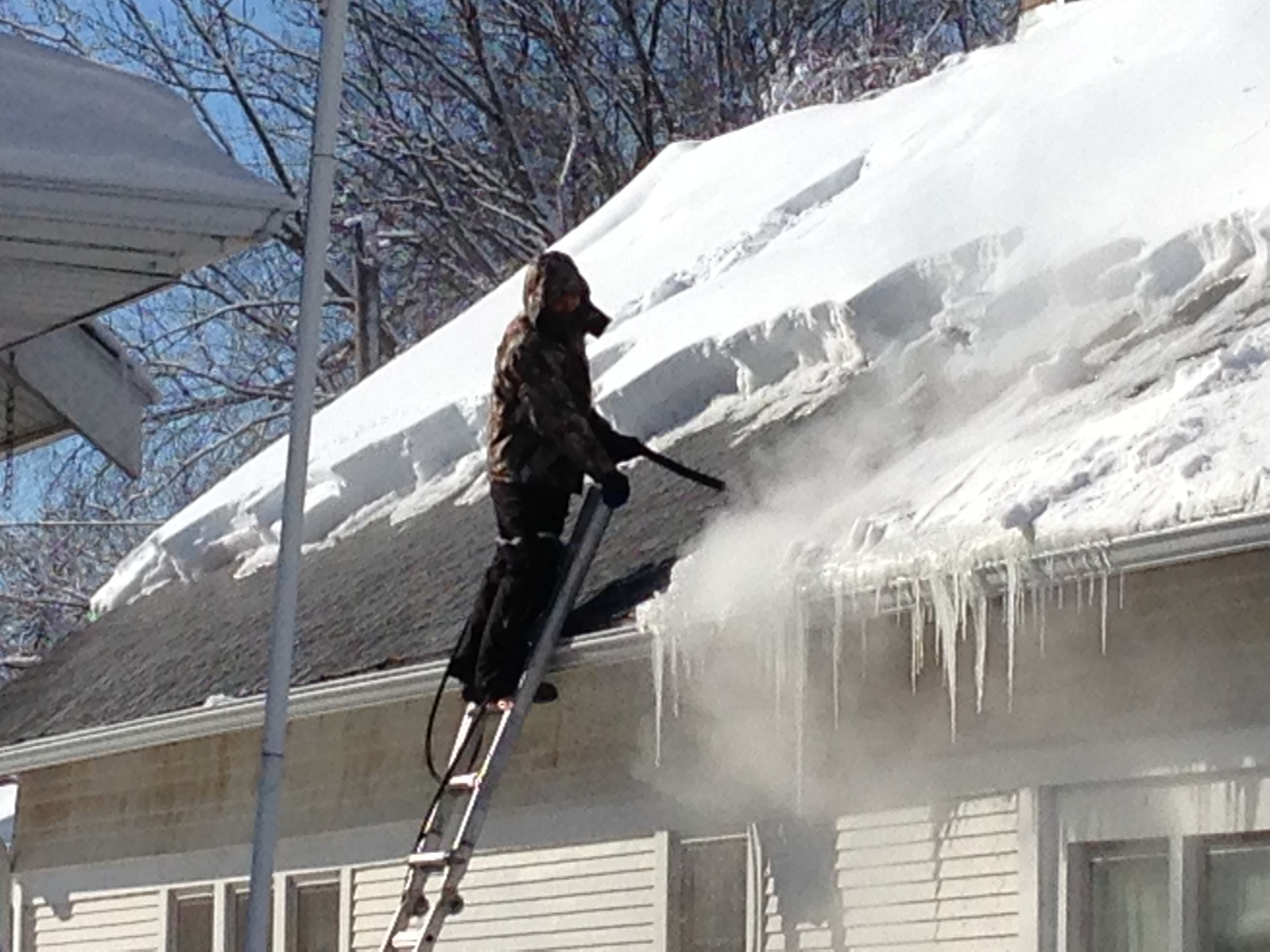 Rooftop ice dam removal, ice dam steaming