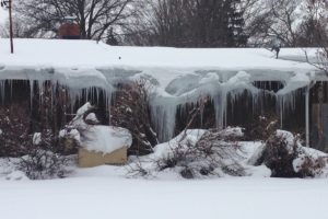 Ice dam removal project on a home