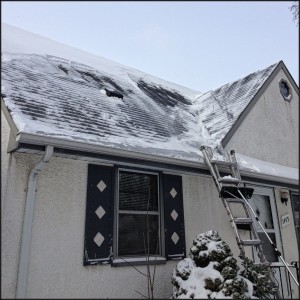 Ice dam on roof, roof rake