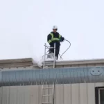 Commercial building ice dam removal