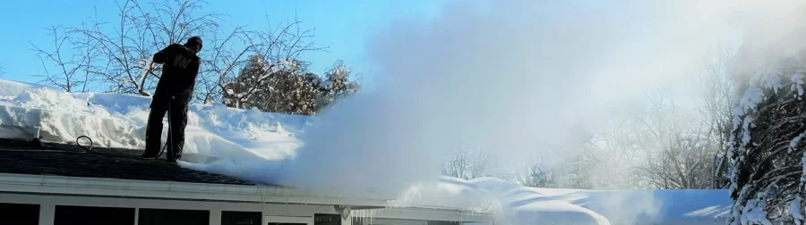 Clearing ice dam with steam.
