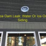 Ice dam causing roof leak under overhang on roof.