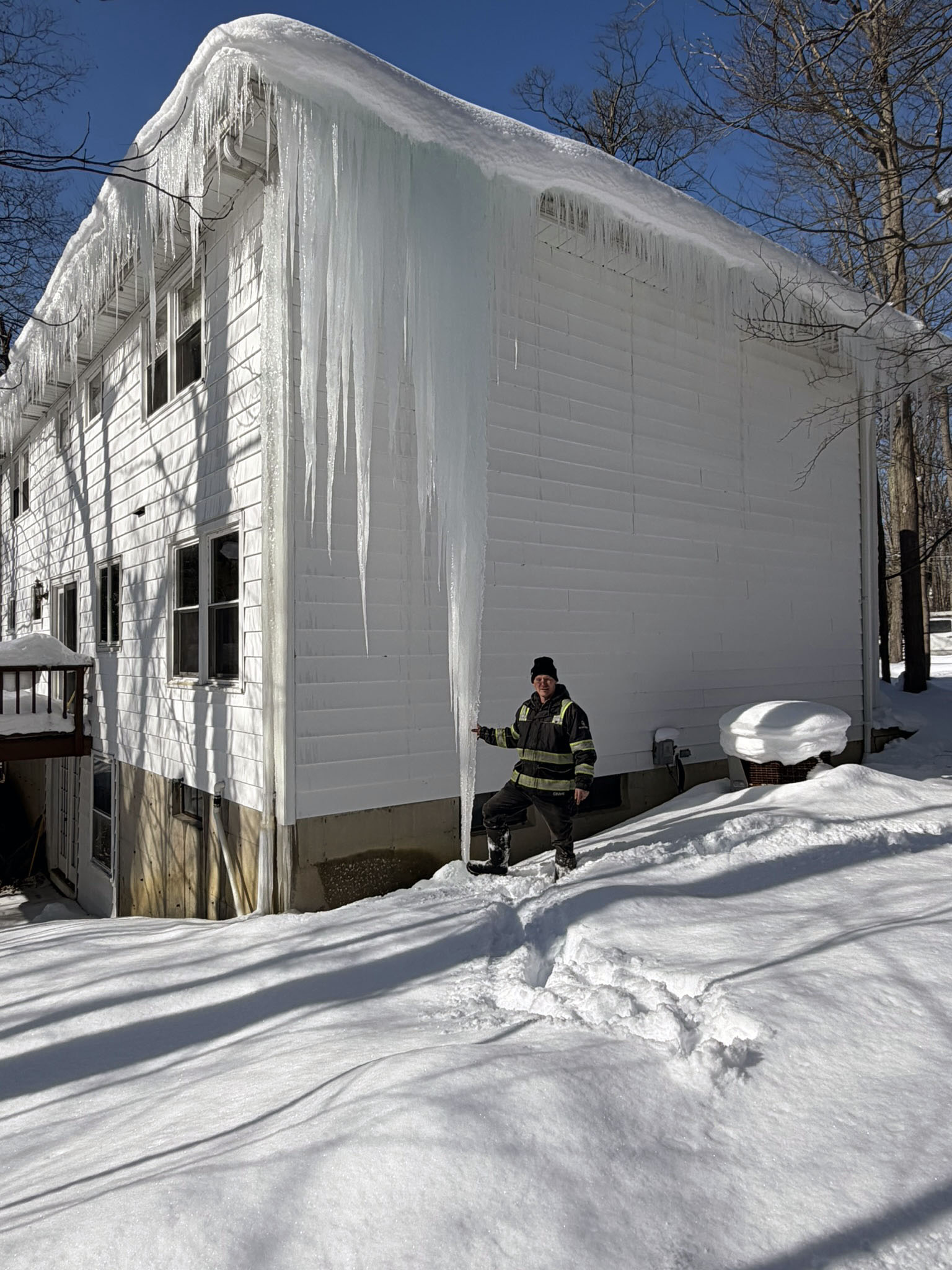 Large ice dam on home in Eden NY Large ice dam removal on home near Buffalo NY.