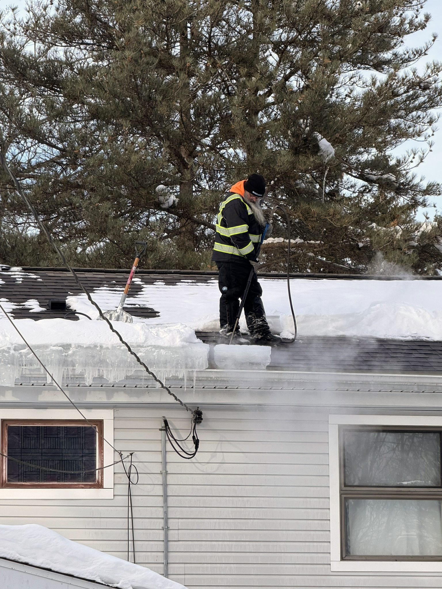 Orchard Park NY Ice Dam Removal Project Stopping roof leaks with steam ice dam removal in Orchard Park.